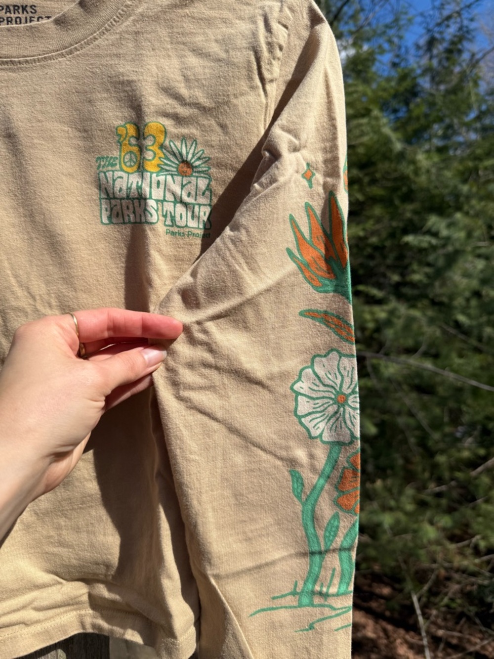 Parks Project Tan Tee with Green & Orange Floral Tour Graphic - Picture 2 of 6